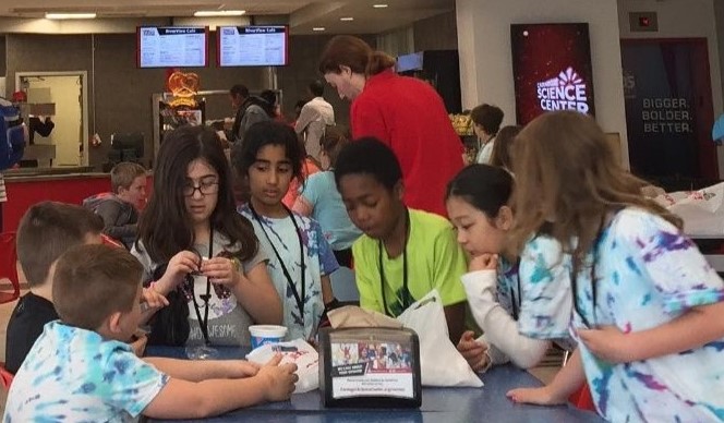 A group of school children and their teachers at the museum 